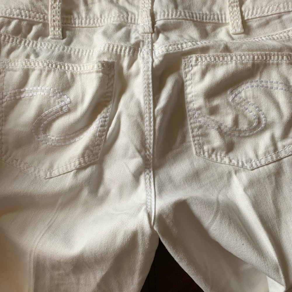 Women’s silver brand white capris
